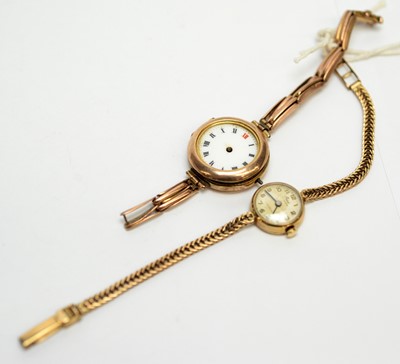 Lot 211 - Two gold cased cocktail watches.
