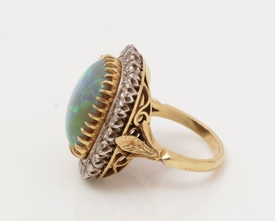Lot 481 - A black opal and diamond cluster ring