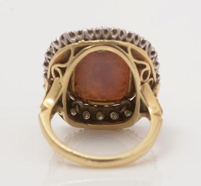 Lot 481 - A black opal and diamond cluster ring