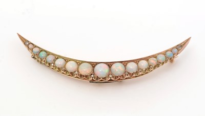 Lot 485 - A Victorian opal and diamond crescent brooch
