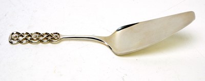 Lot 624 - An 830 standard silver cake slice, by David Andersen