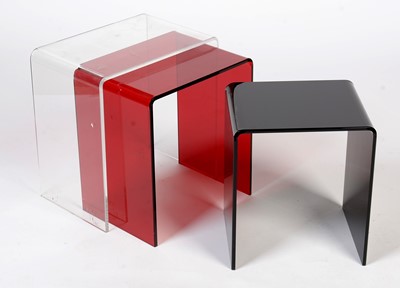 Lot 404 - A contemporary nest of perspex occasional tables