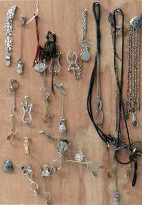Lot 1274 - 19th Century skirt lifters and chatelaines