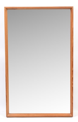 Lot 444 - A mid Century teak wall mirror, probably Danish.