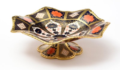 Lot 785 - A Royal Crown Derby 'Imari' pattern stemmed circular comport.