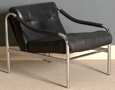 Lot 390 - A mid 20th Century open arm chair.