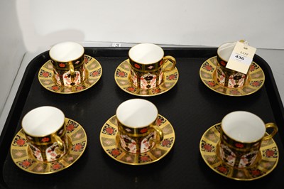 Lot 436 - A set of Royal Crown Derby Imari pattern coffee cups and saucers