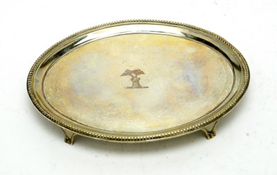 Lot 563 - A George III silver teapot stand, by Elizabeth Jones