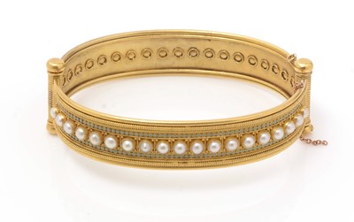 Lot 407 - Manor of Castellani: an Etruscan revival half-pearl, enamel and yellow metal bangle