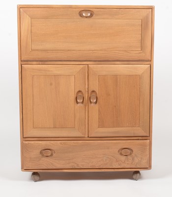 Lot 323 - Ercol: an elm Winsor No. 430 serving cabinet