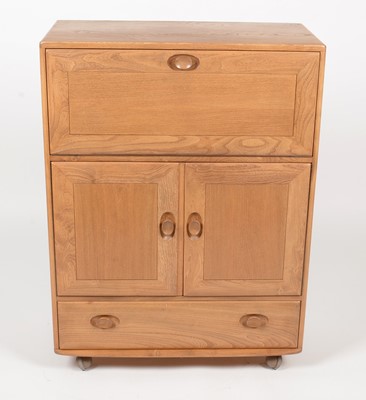 Lot 324 - Ercol: an elm Winsor No. 430 serving cabinet