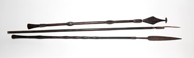 Lot 959 - Two fishing spears and a tribal stick