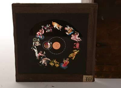 Lot 799 - A collection of mechanical and other magic lantern slides, of the planets