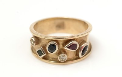 Lot 502 - A diamond, sapphire, ruby and emerald ring