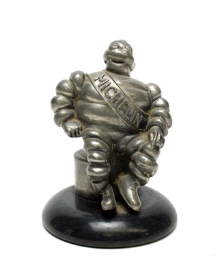 Lot 811 - A car mascot for Michelin.