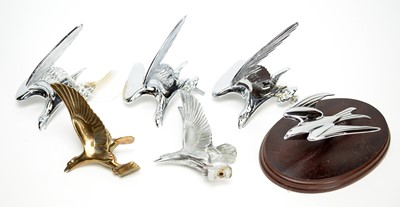 Lot 812 - A collection of reproduction car mascots.