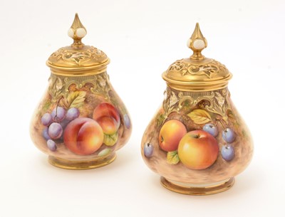Lot 778 - Pair of Royal Worcester fruit painted vases and covers