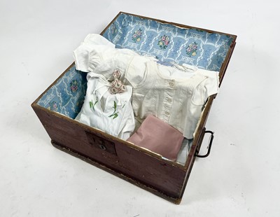 Lot 1198 - A 19th Century trunk containing a family cache of baby dresses