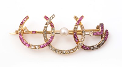 Lot 365 - An Edwardian ruby, diamond and pearl brooch