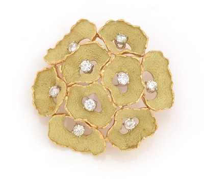 Lot 508 - A 1980s gold and diamond brooch