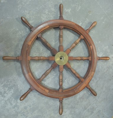 Lot 985 - A 20th Century turned mahogany eight-spoke ship's wheel.