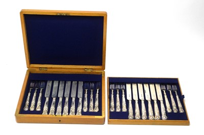 Lot 599 - A set of twelve Victorian silver fruit knives and forks, by Hamilton & Inches