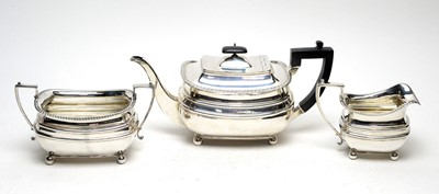 Lot 573 - A three piece Edwardian silver tea service, by James Dixon & Sons Ltd