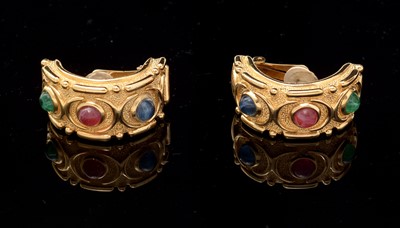 Lot 851 - Christian Dior: a pair of gilt-metal and coloured plastic clip earrings