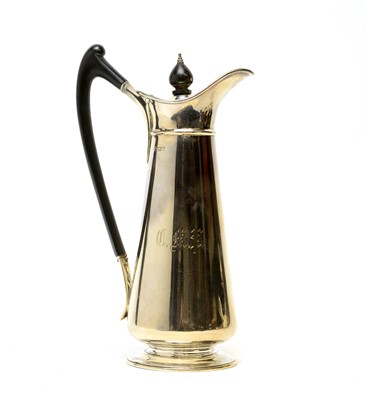Lot 592 - A George V Arts and Crafts silver jug, by Harrison Brothers & Howson