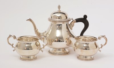 Lot 91 - A three piece silver tea service, by Barker Ellis Silver Co