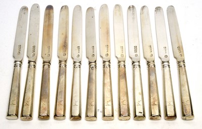 Lot 555 - A set of twelve George III silver tea knives, by Richard Sawyer