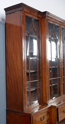 Lot 1299 - A large and impressive George III mahogany breakfront secretaire bookcase