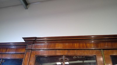 Lot 1299 - A large and impressive George III mahogany breakfront secretaire bookcase