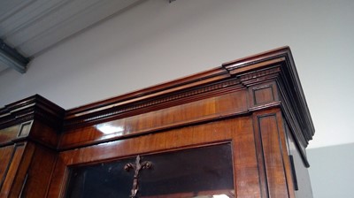 Lot 1299 - A large and impressive George III mahogany breakfront secretaire bookcase