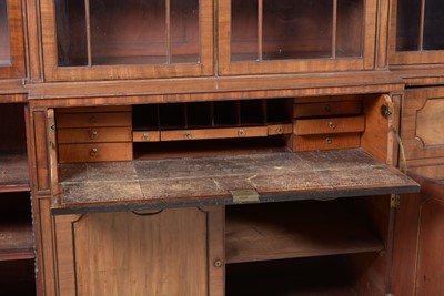 Lot 1299 - A large and impressive George III mahogany breakfront secretaire bookcase