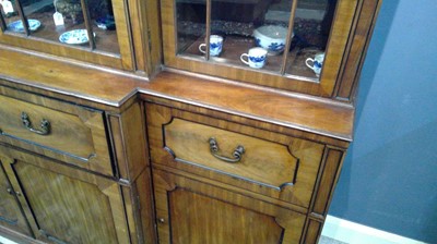 Lot 1299 - A large and impressive George III mahogany breakfront secretaire bookcase
