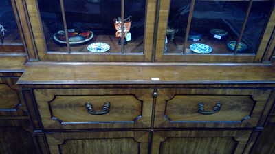 Lot 1299 - A large and impressive George III mahogany breakfront secretaire bookcase