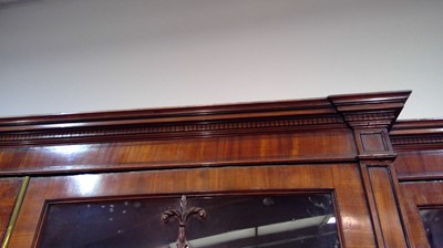 Lot 1299 - A large and impressive George III mahogany breakfront secretaire bookcase