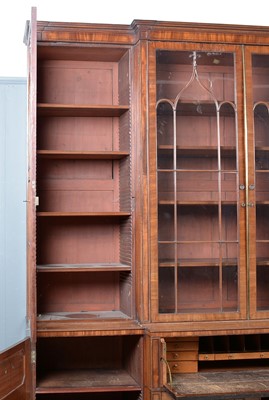 Lot 1299 - A large and impressive George III mahogany breakfront secretaire bookcase