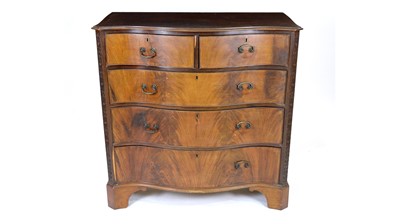 Lot 1301 - A George III style mahogany serpentine fronted chest.