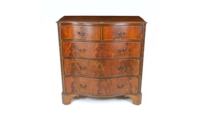 Lot 1362 - A George III style mahogany serpentine fronted chest.