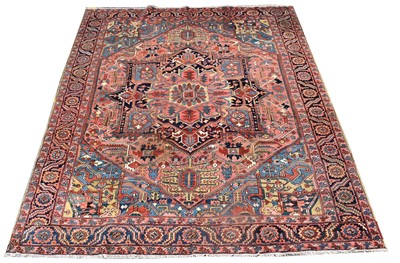 Lot 637 - A Heriz carpet