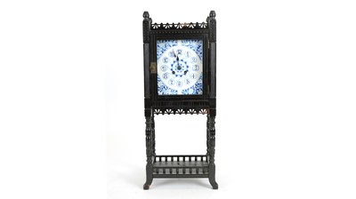 Lot 1261 - An aesthetic movement ebonised clock
