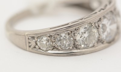 Lot 378 - A seven stone diamond ring