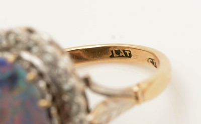 Lot 381 - An opal doublet and diamond cluster ring