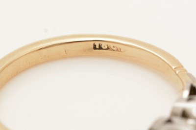 Lot 384 - A sapphire and diamond ring