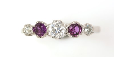 Lot 385 - A ruby and diamond ring