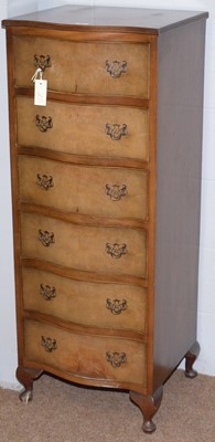 Lot 54 - A Georgian style burr-walnut serpentine fronted narrow chest.
