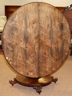 Lot 25 - A Victorian rosewood tilt action breakfast table.