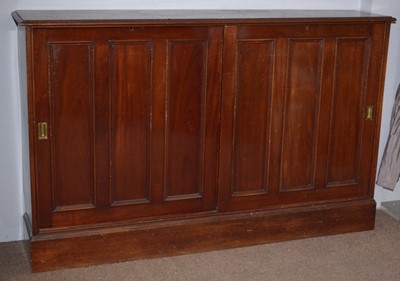Lot 45 - A large mahogany storage cupboard.